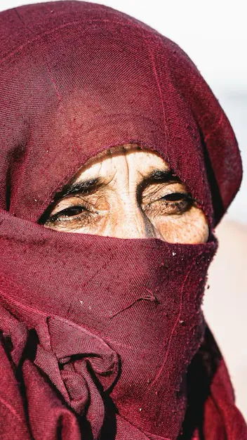 ai character: Old Arabic Grandma background