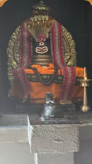 ai character: LordAkhilandeswara background
