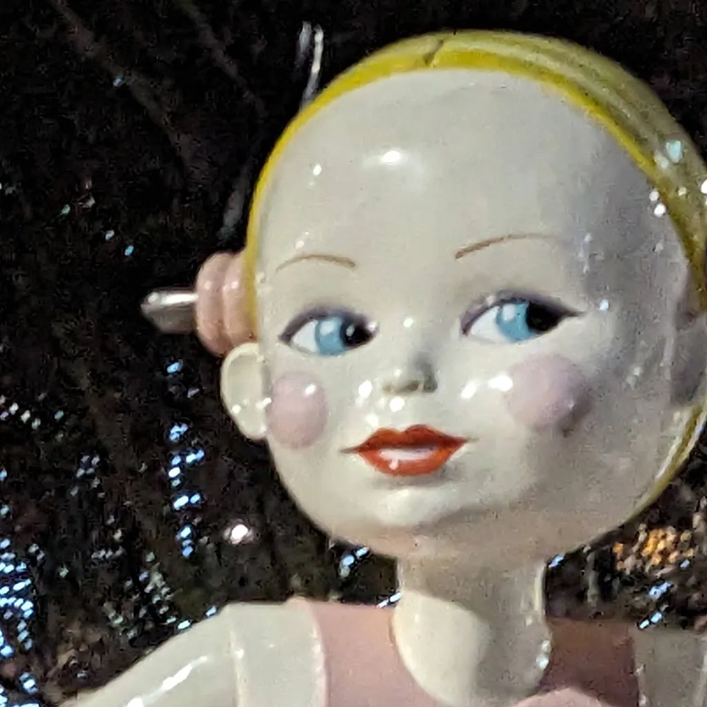 chat with ai character: The doll
