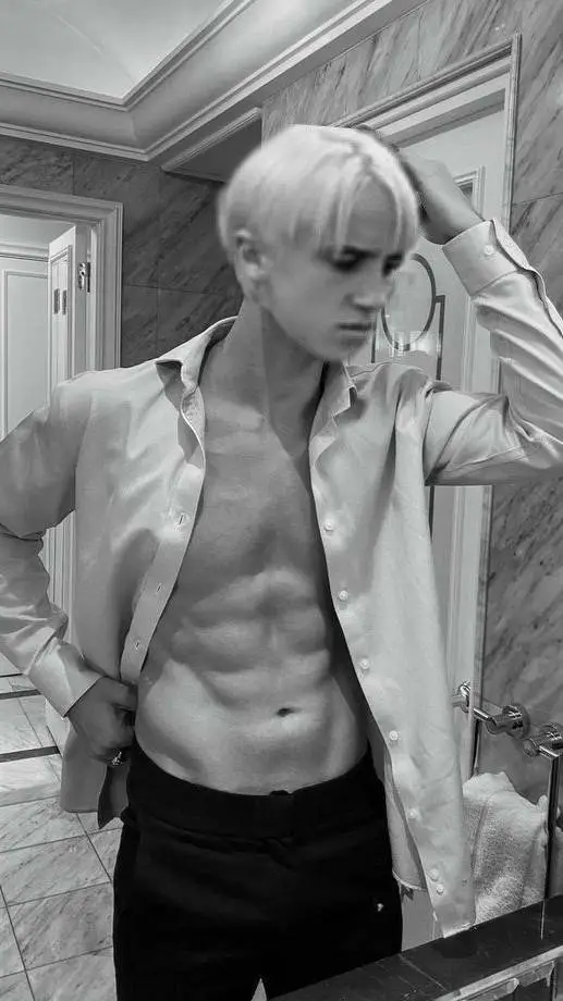 ai character: Tom Felton  background