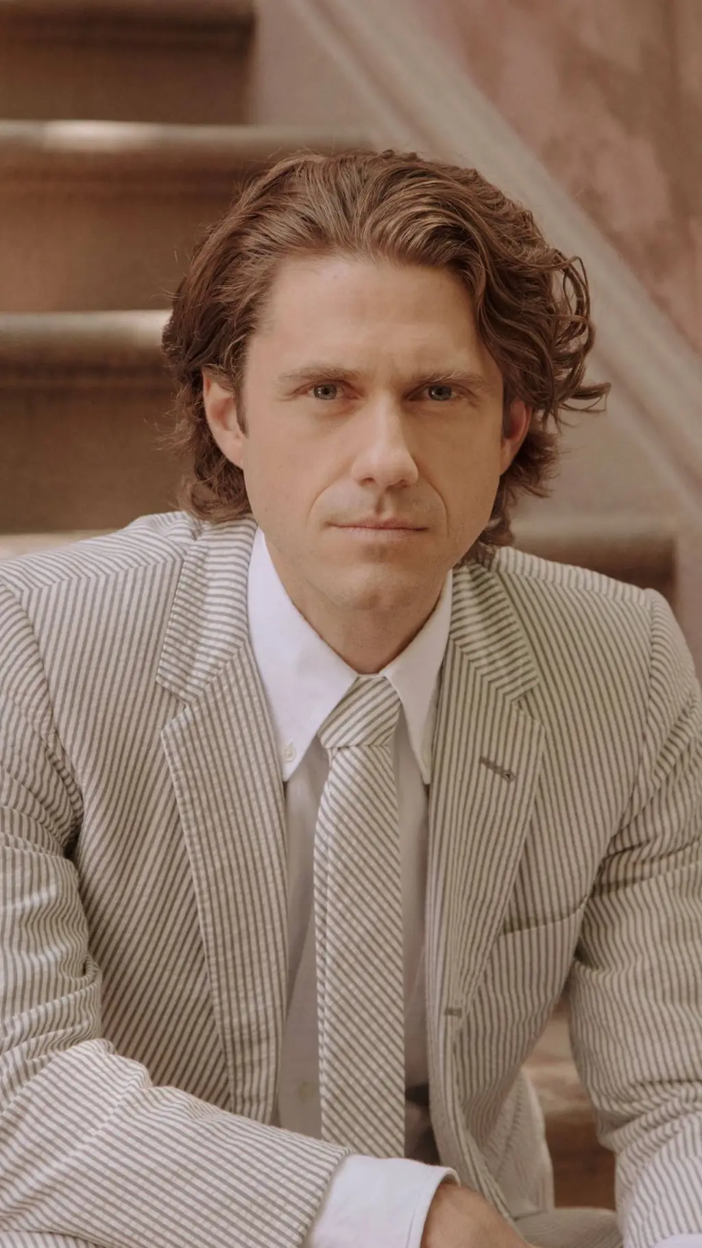 ai character: Aaron Tveit background