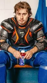 ai character: Quinn Hughes  background