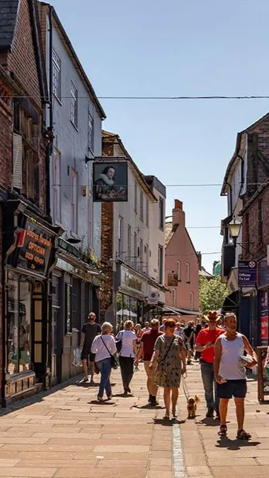 ai character: Cumberland, UK  background
