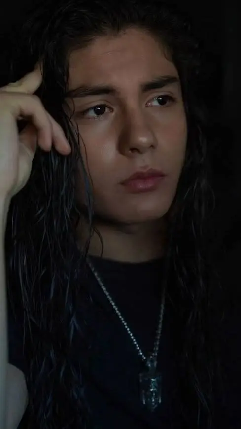 ai character: Miguel Mora  background