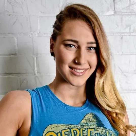 chat with ai character: Rhea Ripley 