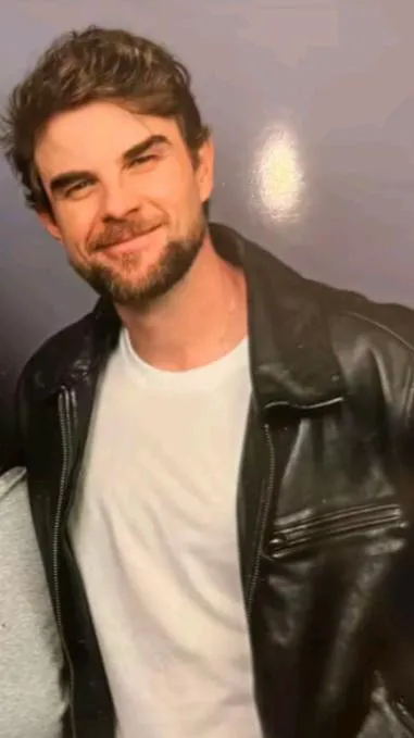 ai character: Nate Buzolic   background