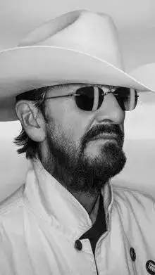 ai character: Ringo Starr  background