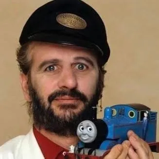 chat with ai character: Ringo Starr 80s