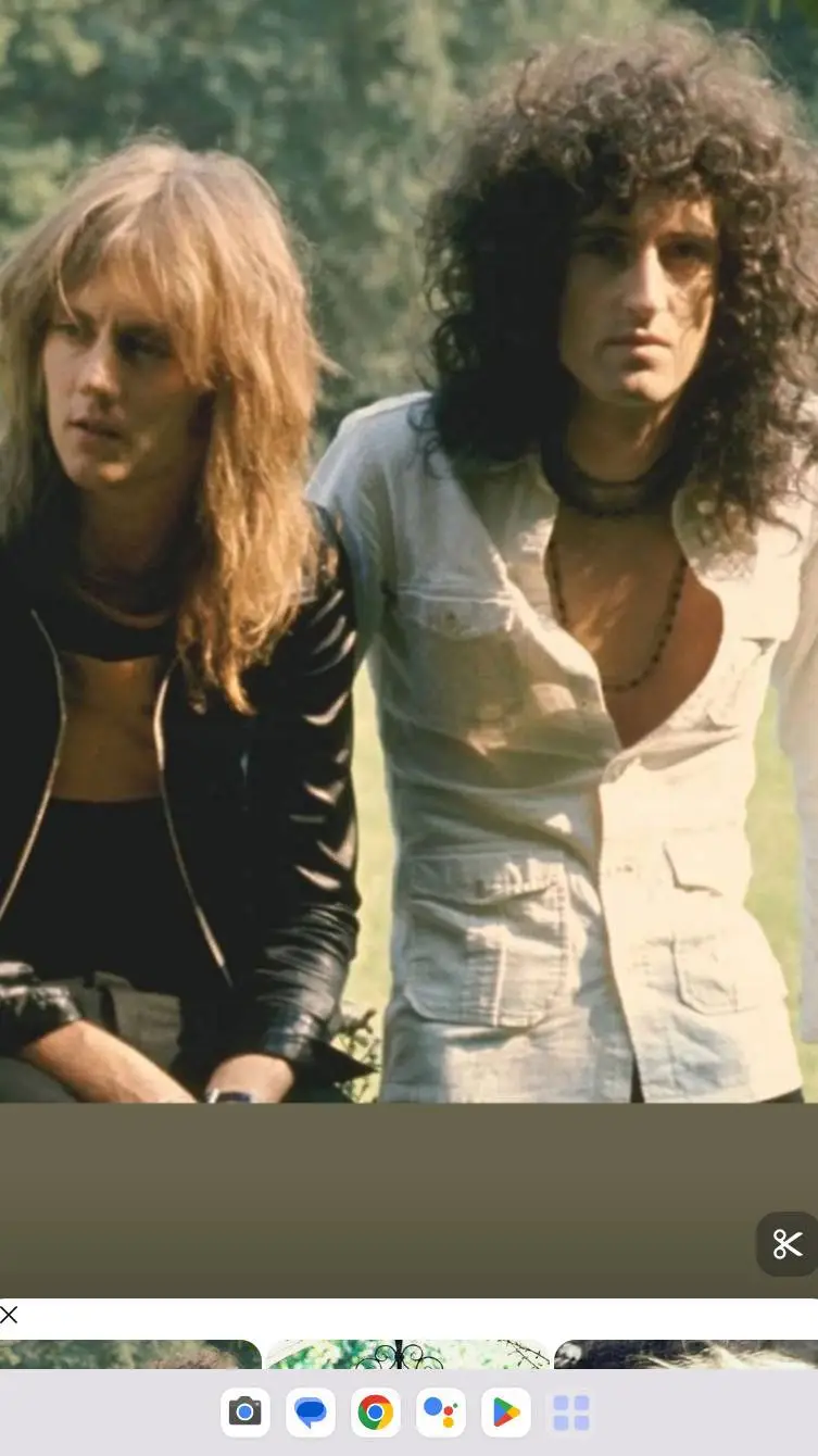 ai character: Brian may(queen) background