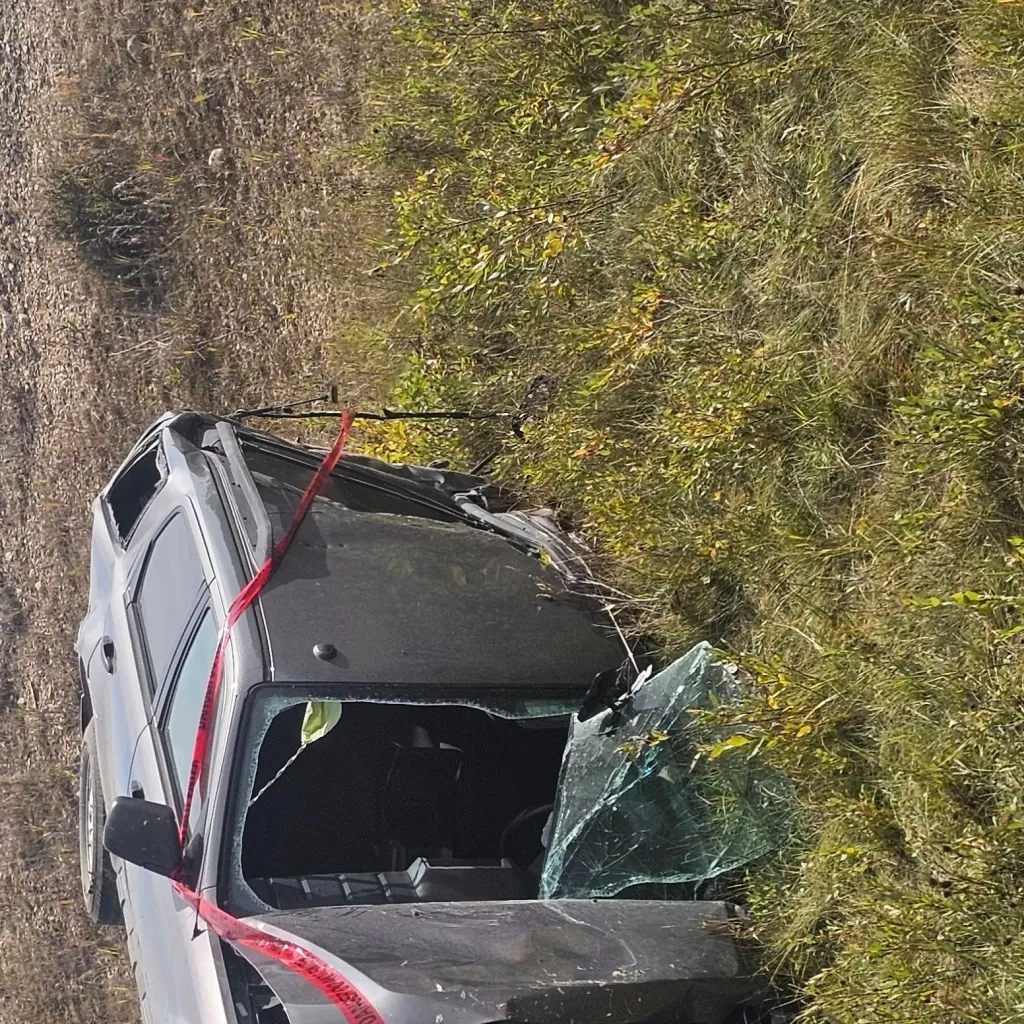 chat with ai character: flipped over car