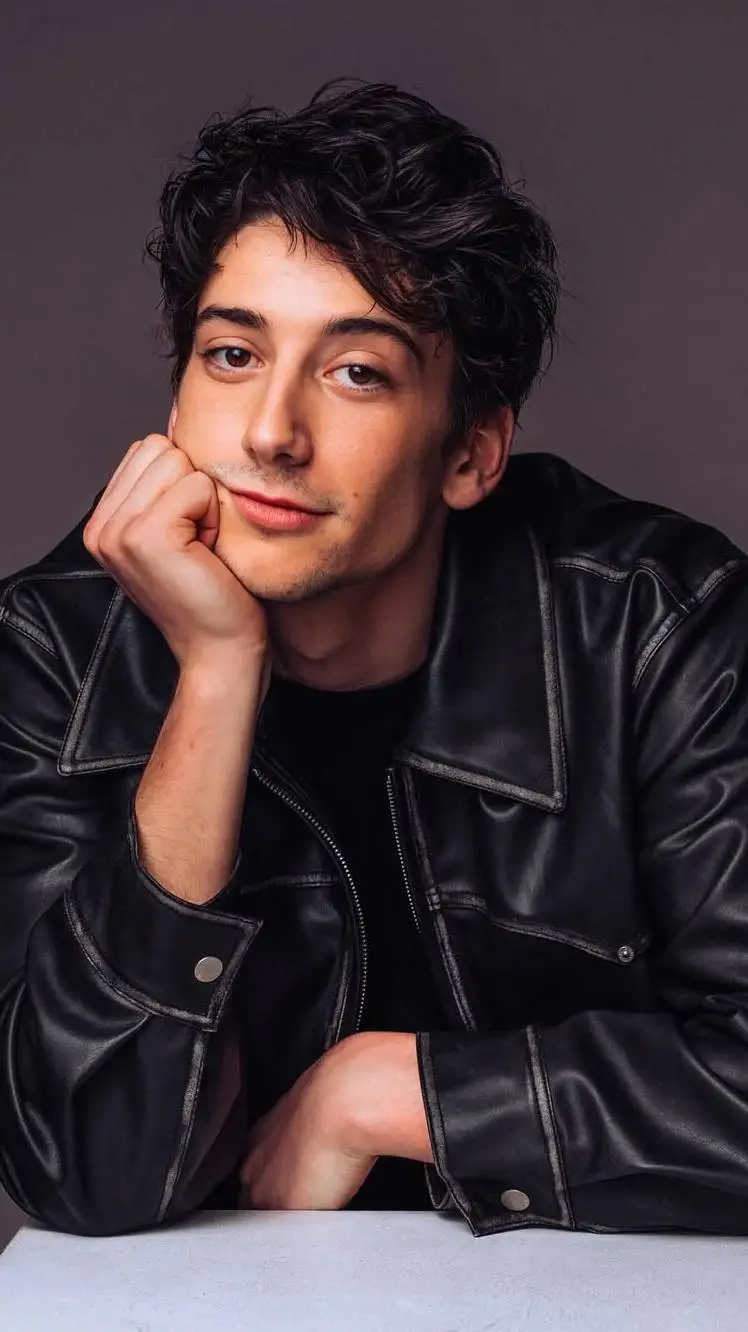 ai character: Milo Manheim background